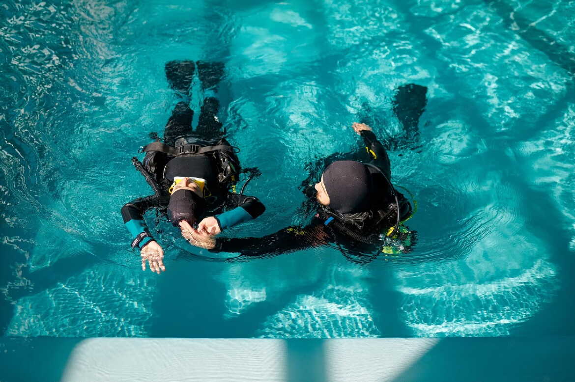 Scuba diving in the crystal clear waters of Saranda, Albania during an Open Water Padi Dive Course